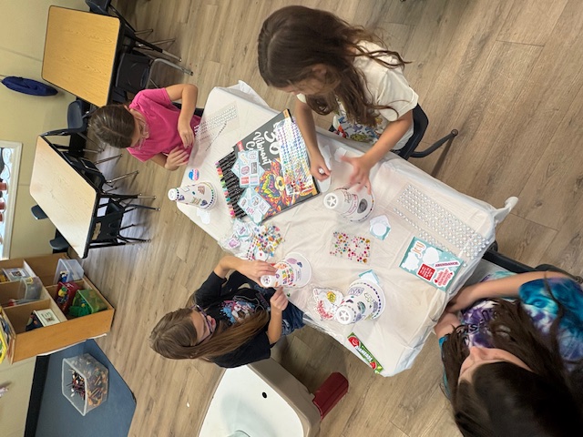 Children creating their Crafty Kids project