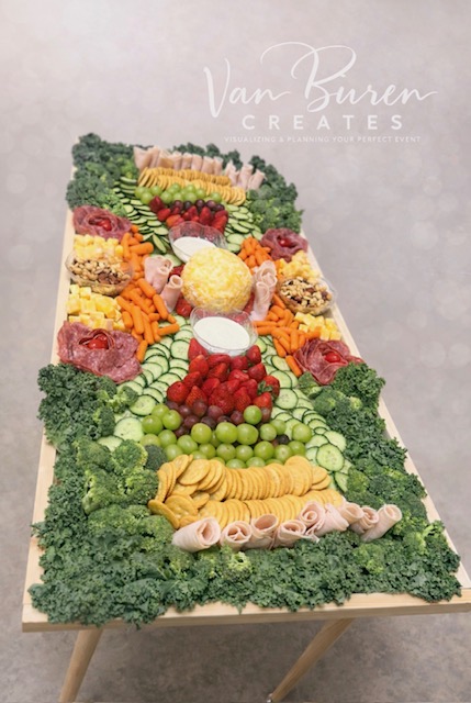 Grazing table styled with a charcuterie and fruit grazing spread